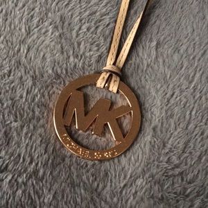 Michael Kors Gold Bag Emblem